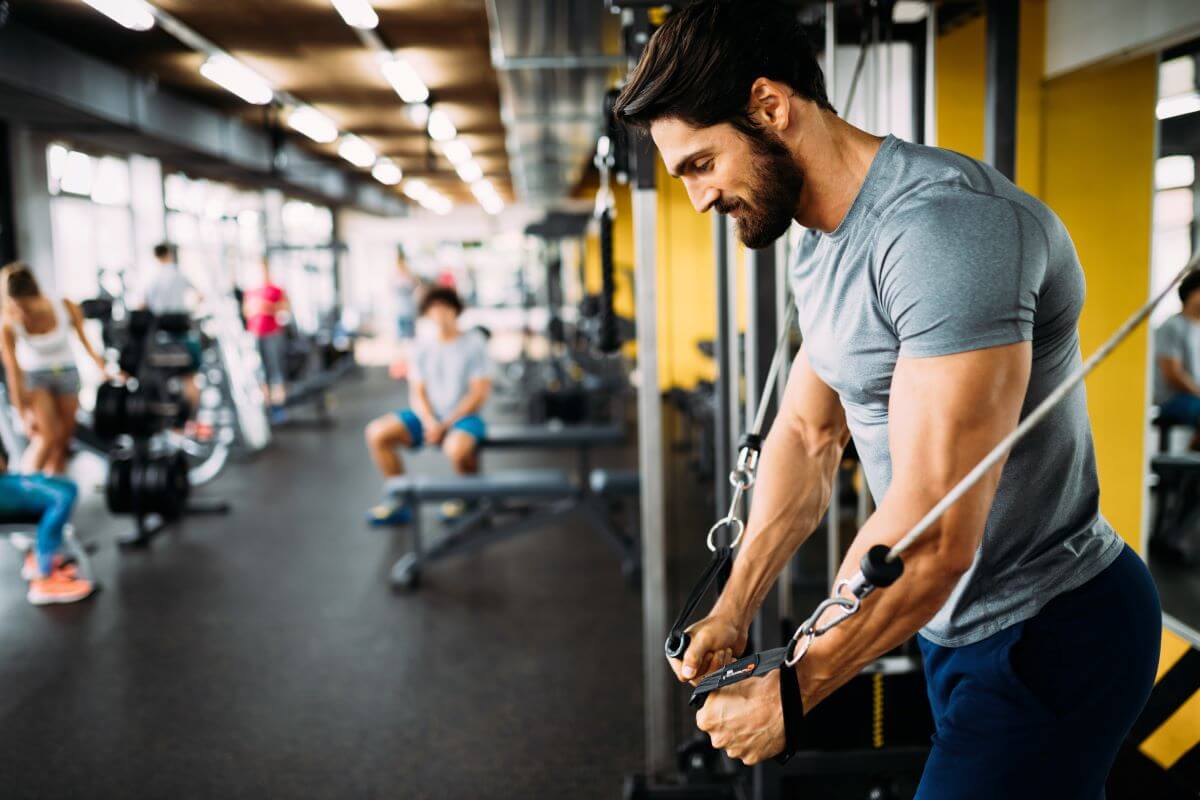 Man performing Chest Flys as part of a chest superset