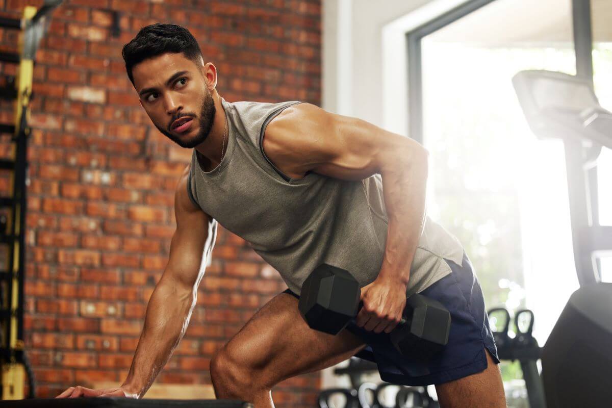 Man Performing Rows as Part of 4 Day Push/Pull Workout Split